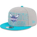 gorra-plana-gris-y-azul-snapback-9fifty-draft-edition-2023-de-charlotte-hornets-nba-de-new-era