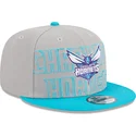 gorra-plana-gris-y-azul-snapback-9fifty-draft-edition-2023-de-charlotte-hornets-nba-de-new-era