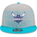 gorra-plana-gris-y-azul-snapback-9fifty-draft-edition-2023-de-charlotte-hornets-nba-de-new-era