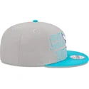 gorra-plana-gris-y-azul-snapback-9fifty-draft-edition-2023-de-charlotte-hornets-nba-de-new-era