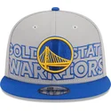 gorra-plana-gris-y-azul-snapback-9fifty-draft-edition-2023-de-golden-state-warriors-nba-de-new-era