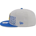 gorra-plana-gris-y-azul-snapback-9fifty-draft-edition-2023-de-golden-state-warriors-nba-de-new-era