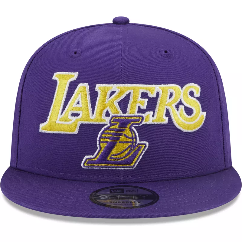 white and purple lakers hat