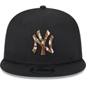 gorra-plana-negra-snapback-con-logo-marron-9fifty-seasonal-infill-de-new-york-yankees-mlb-de-new-era