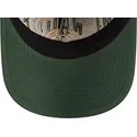 gorra-curva-gris-y-verde-ajustable-9twenty-tip-off-2023-de-milwaukee-bucks-nba-de-new-era