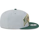 gorra-plana-gris-y-verde-snapback-9fifty-tip-off-2023-de-milwaukee-bucks-nba-de-new-era