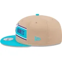 gorra-plana-marron-y-azul-snapback-9fifty-draft-2024-de-charlotte-hornets-nba-de-new-era