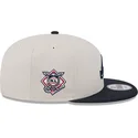 gorra-plana-beige-y-azul-marino-snapback-9fifty-4th-of-july-de-atlanta-braves-mlb-de-new-era