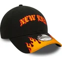 justerbar-svart-och-orange-9twenty-race-flame-kurvkeps-fran-new-era