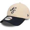 casquette-courbee-beige-et-bleue-marine-ajustable-9twenty-peached-cotton-new-era