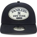 casquette-courbee-bleue-marine-snapback-9seventy-stretch-snap-patch-new-york-yankees-mlb-new-era