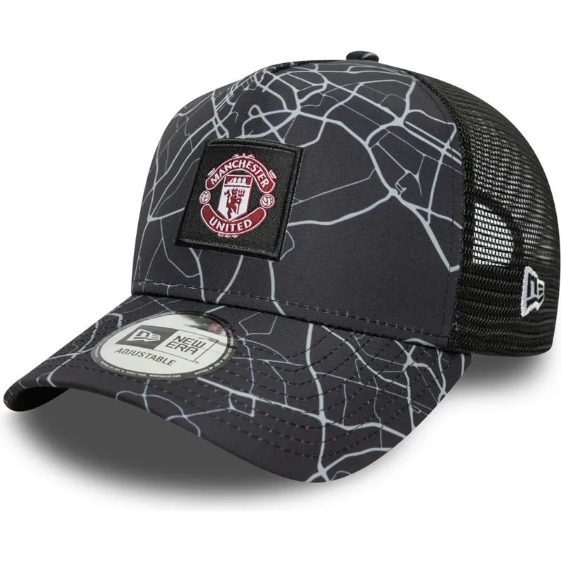 svart-trucker-keps-a-frame-all-over-print-fran-manchester-united-football-club-premier-league-av-new-era
