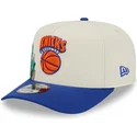 new-era-curved-brim-9fifty-a-frame-precurved-hardwood-classics-new-york-knicks-nba-beige-and-blue-snapback-cap