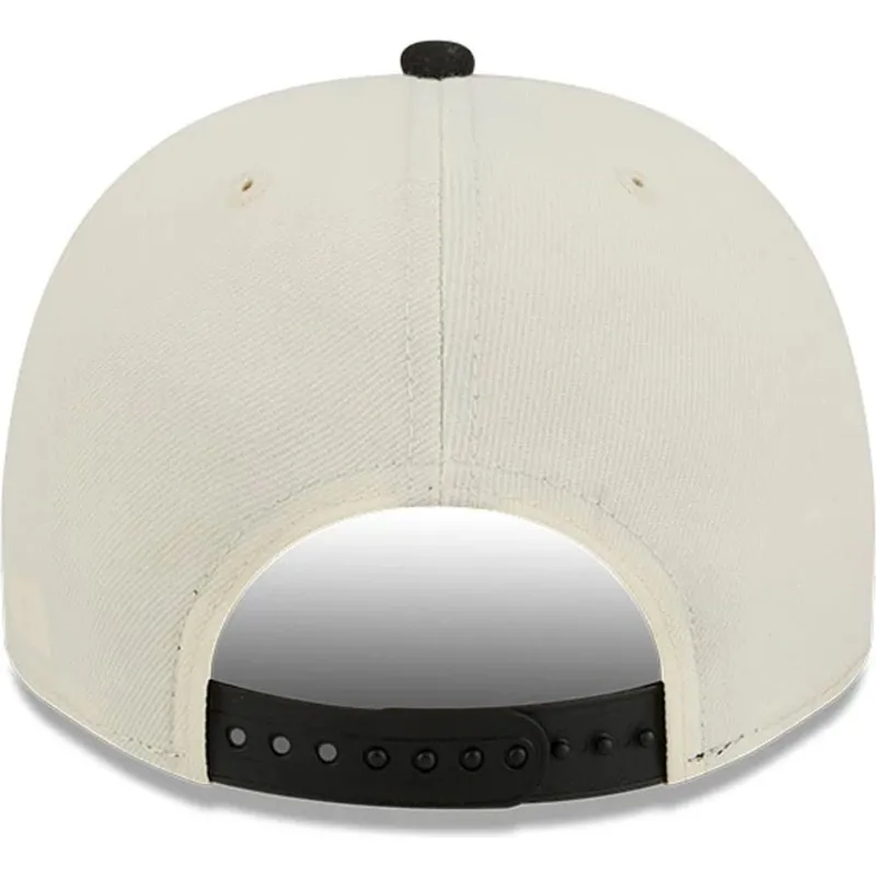 beige-und-schwarze-snapback-kappe-9fifty-a-frame-precurved-hardwood-classics-der-toronto-raptors-nba-von-new-era