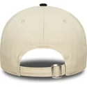 new-era-curved-brim-9twenty-wash-distress-a-frame-beige-and-black-adjustable-cap
