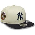 casquette-plate-beige-snapback-avec-logo-bleu-marine-9fifty-original-fit-world-series-new-york-yankees-mlb-new-era