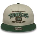 new-era-flat-brim-youth-9fifty-teenage-mutant-ninja-turtles-green-and-beige-snapback-cap